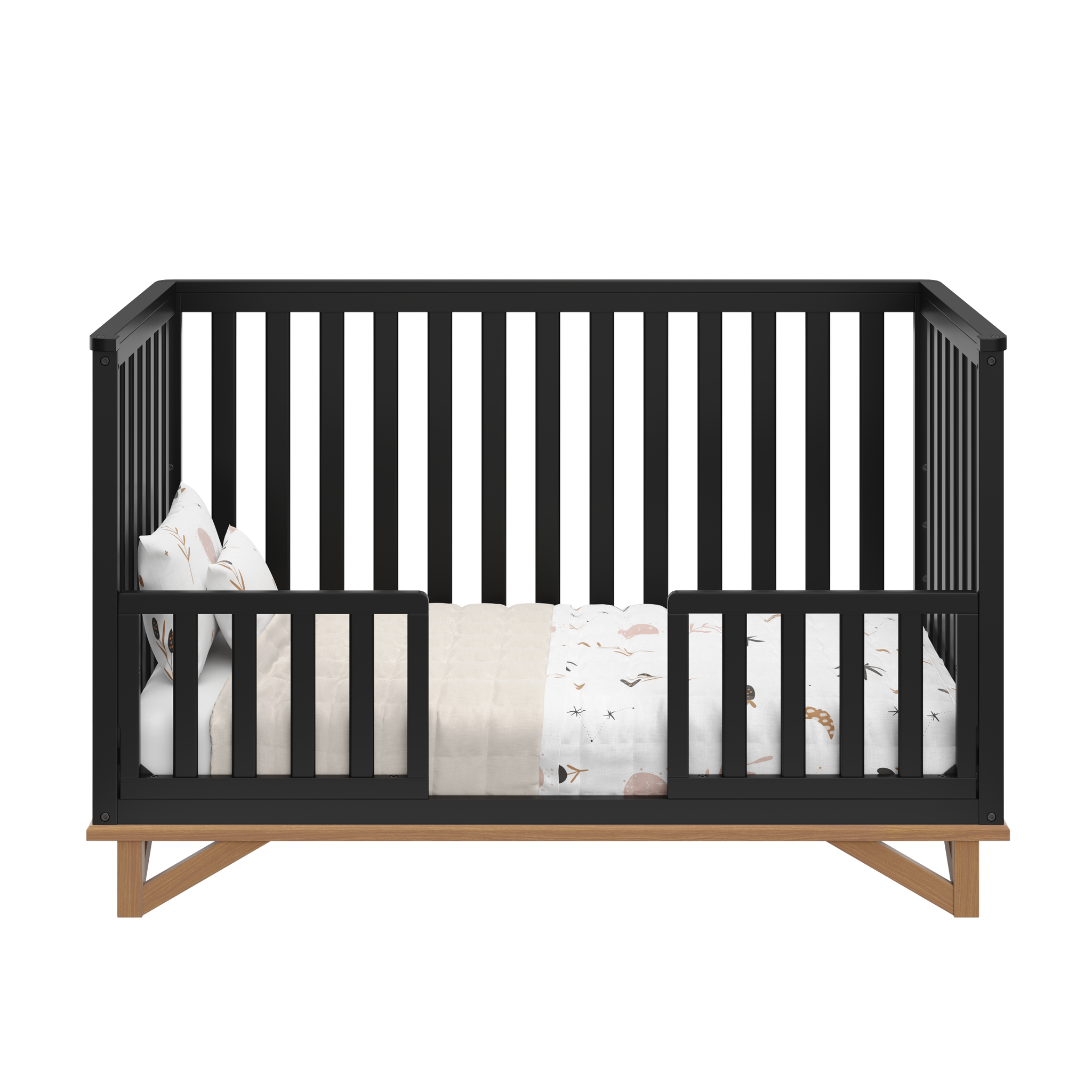 black with vintage driftwood crib in toddler bed conversion with two toddler safety guardrails
