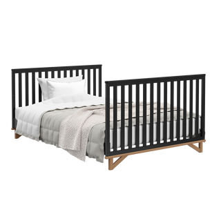 black with vintage driftwood crib in full-size bed conversion with both headboard and footboard