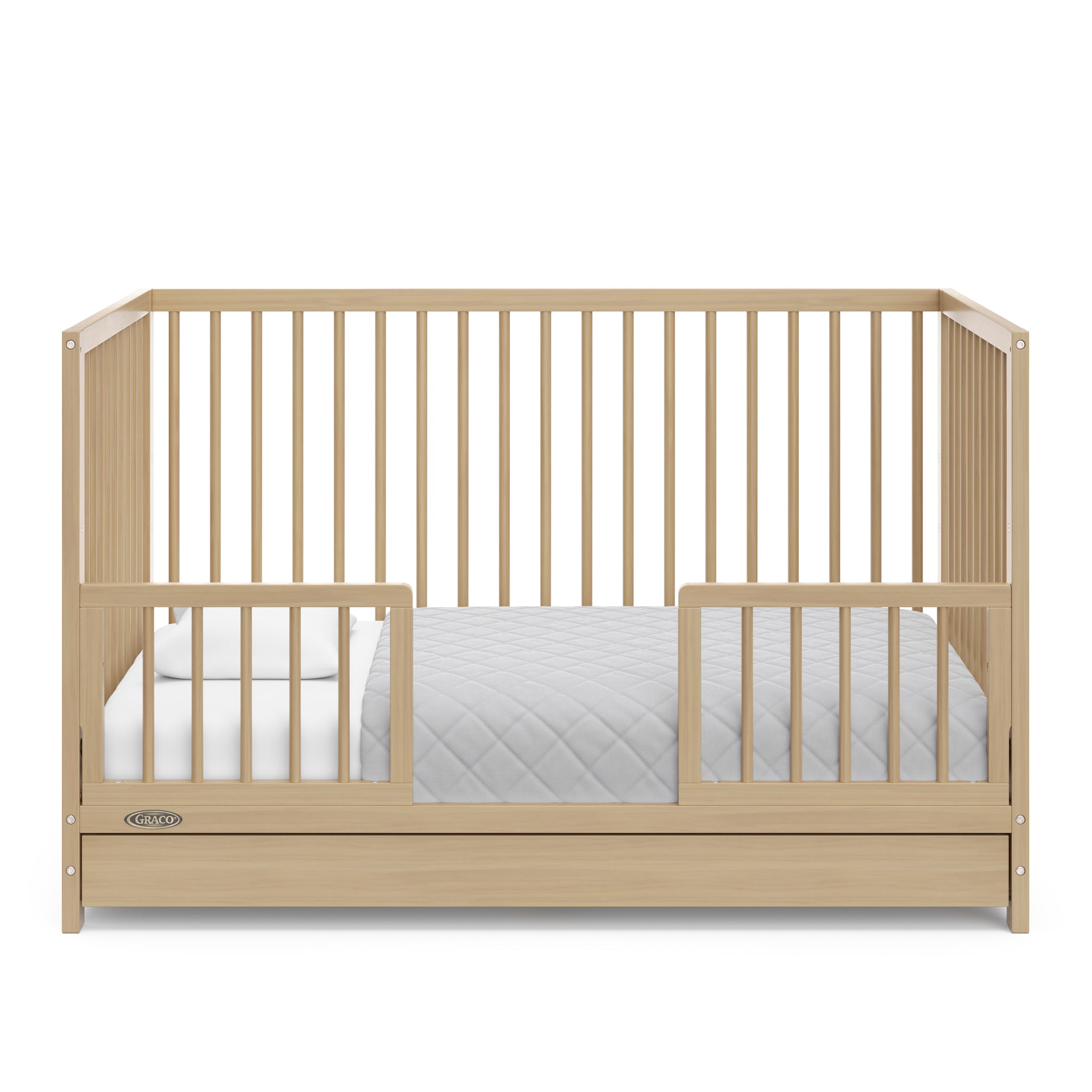 Driftwood crib with drawer in toddler bed conversion with two safety guardrails