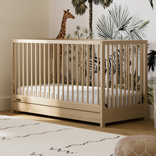 Driftwood crib with drawer in nursery