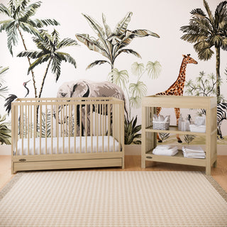 crib with drawer in nursery in driftwood finish