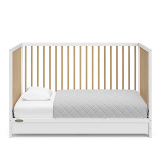 White with driftwood crib with drawer in toddler bed conversion