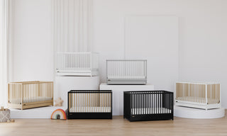 cribs of different colors showcased in the same space