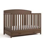 Benton hazelnut crib with drawer angle view