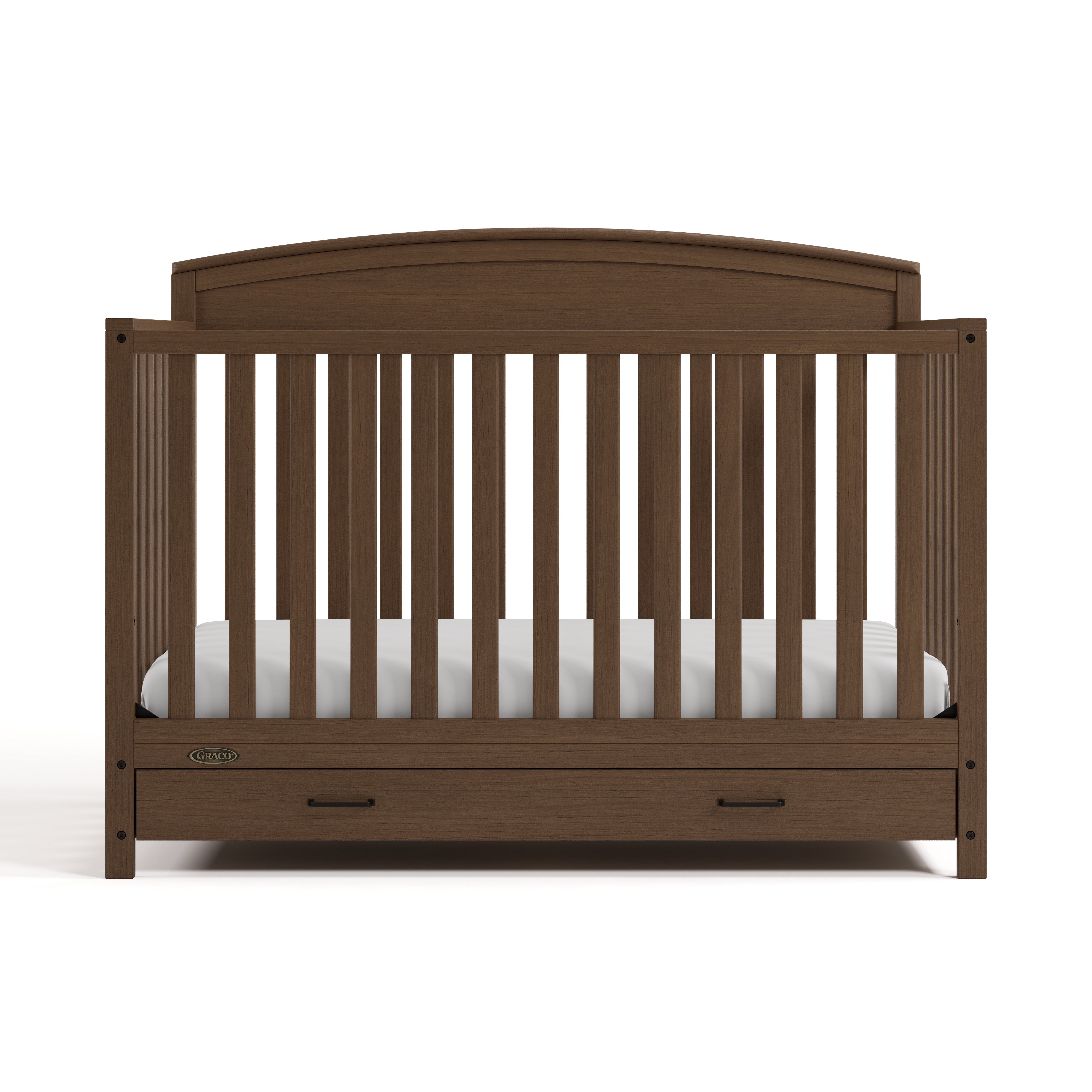 Benton hazelnut crib with drawer front view