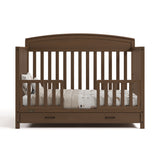 Benton hazelnut crib with drawer converted to toddler bed