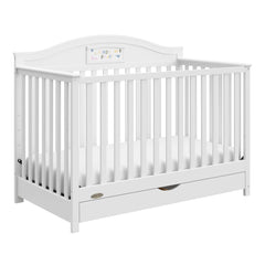graco story white crib with drawer angle view