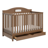 story hazelnut crib with drawer open angle view