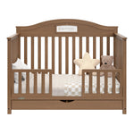 story hazelnut crib with drawer toddler bed conversion with two guardrails