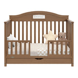 story hazelnut crib with drawer toddler bed conversion with two guardrails