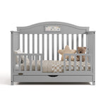 Story pebble gray crib with drawer converted to toddler bed with two guardrails