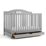 Story pebble gray crib with drawer open angle view