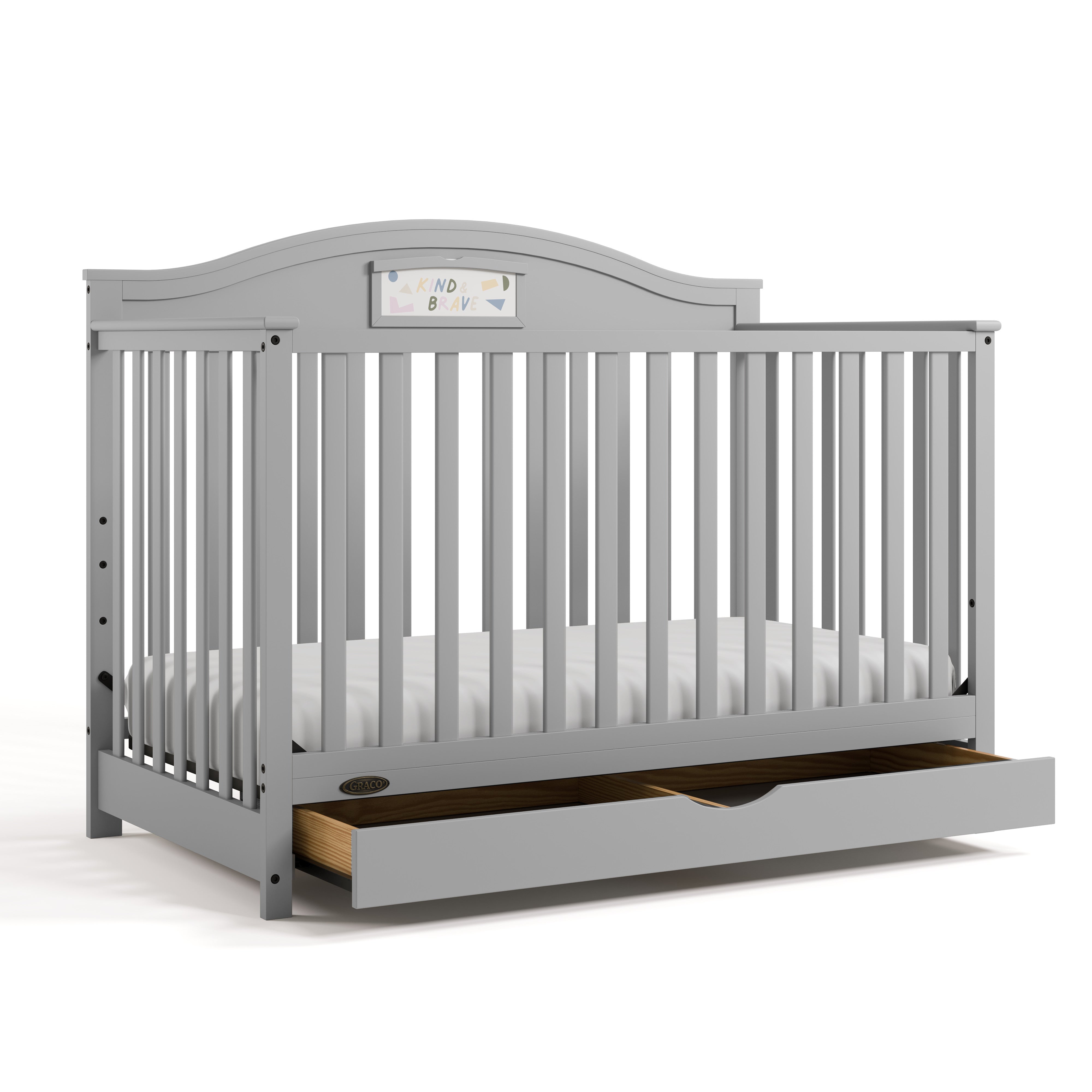 Story pebble gray crib with drawer open angle view