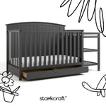 Steveston gray crib and changer with black doodles overlaid on image