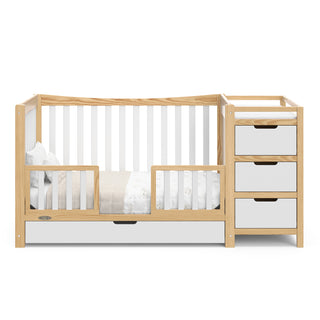 white with natural crib with drawer and changer in toddler bed conversion with two toddler safety guardrails
