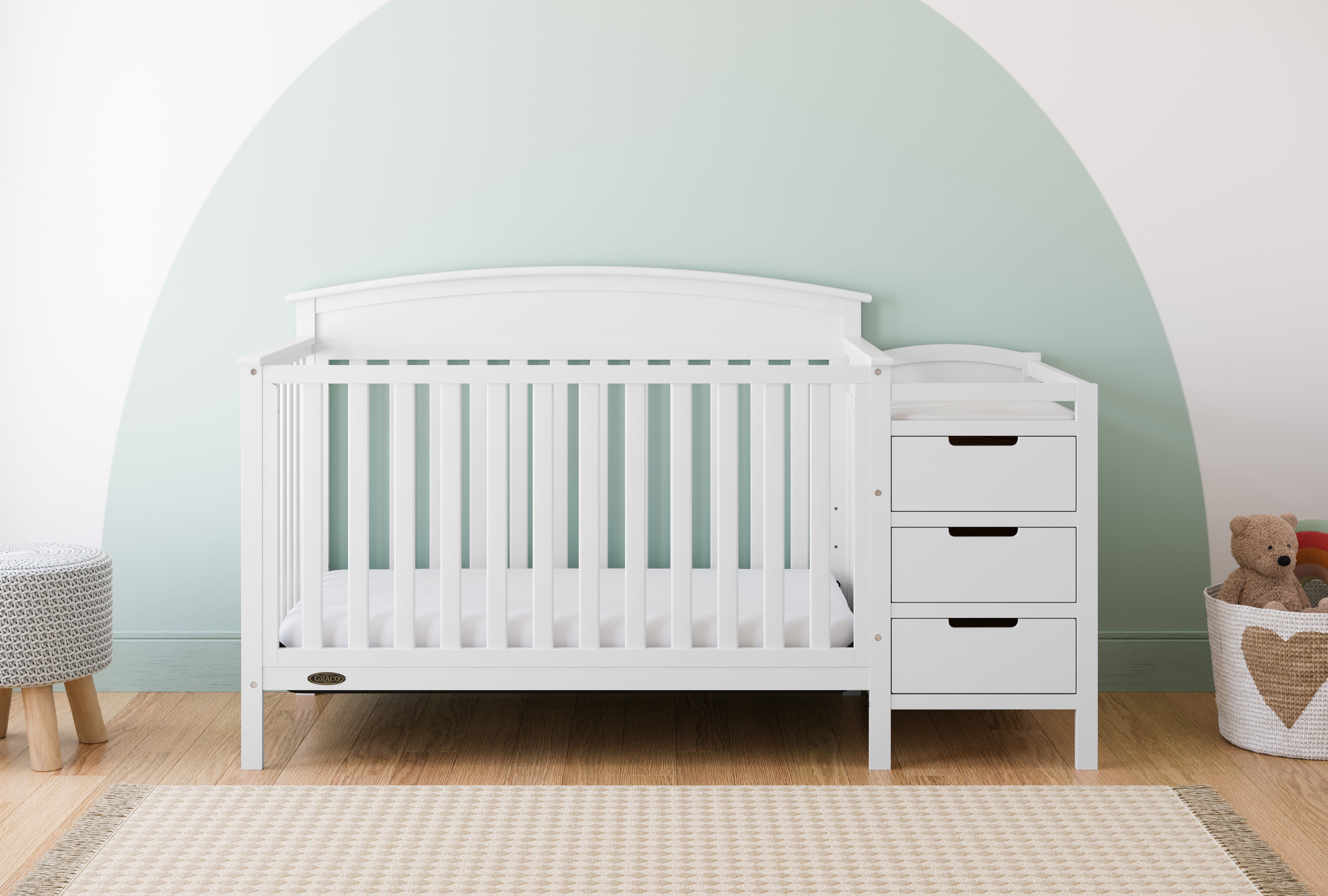 Benton white crib and changer in a nursery