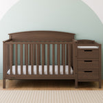 Benton hazelnut crib and changer in a nursery