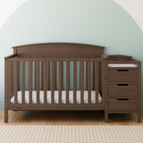 Benton hazelnut crib and changer in a nursery
