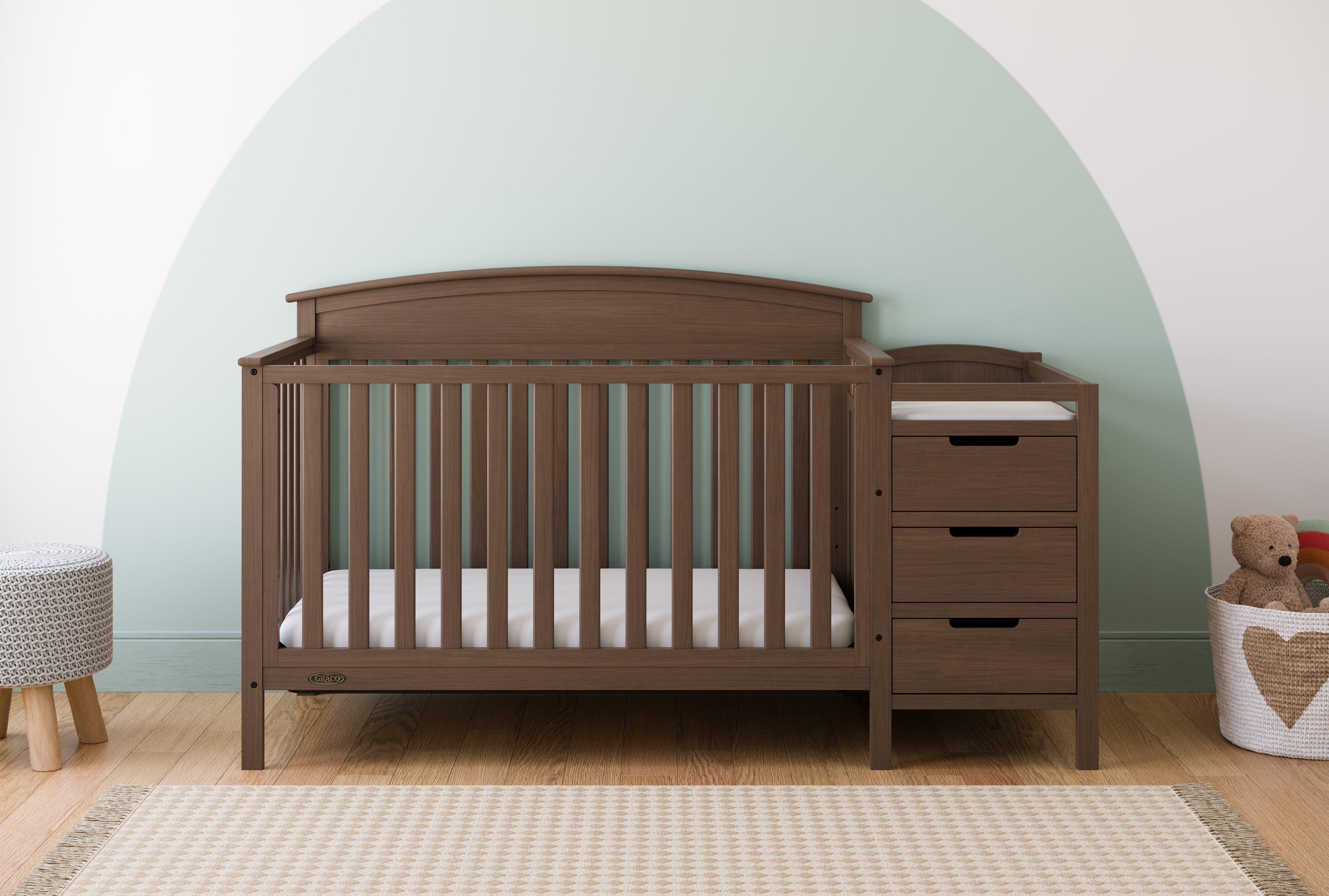 Benton hazelnut crib and changer in a nursery