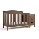 Benton hazelnut crib and changer angle view