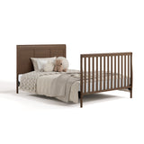 Asheville hazelnut crib with drawer converted to full-size bed with footboard
