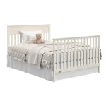 Shiloh frosted oat crib and changer with drawers open full-size bed and footboard conversion