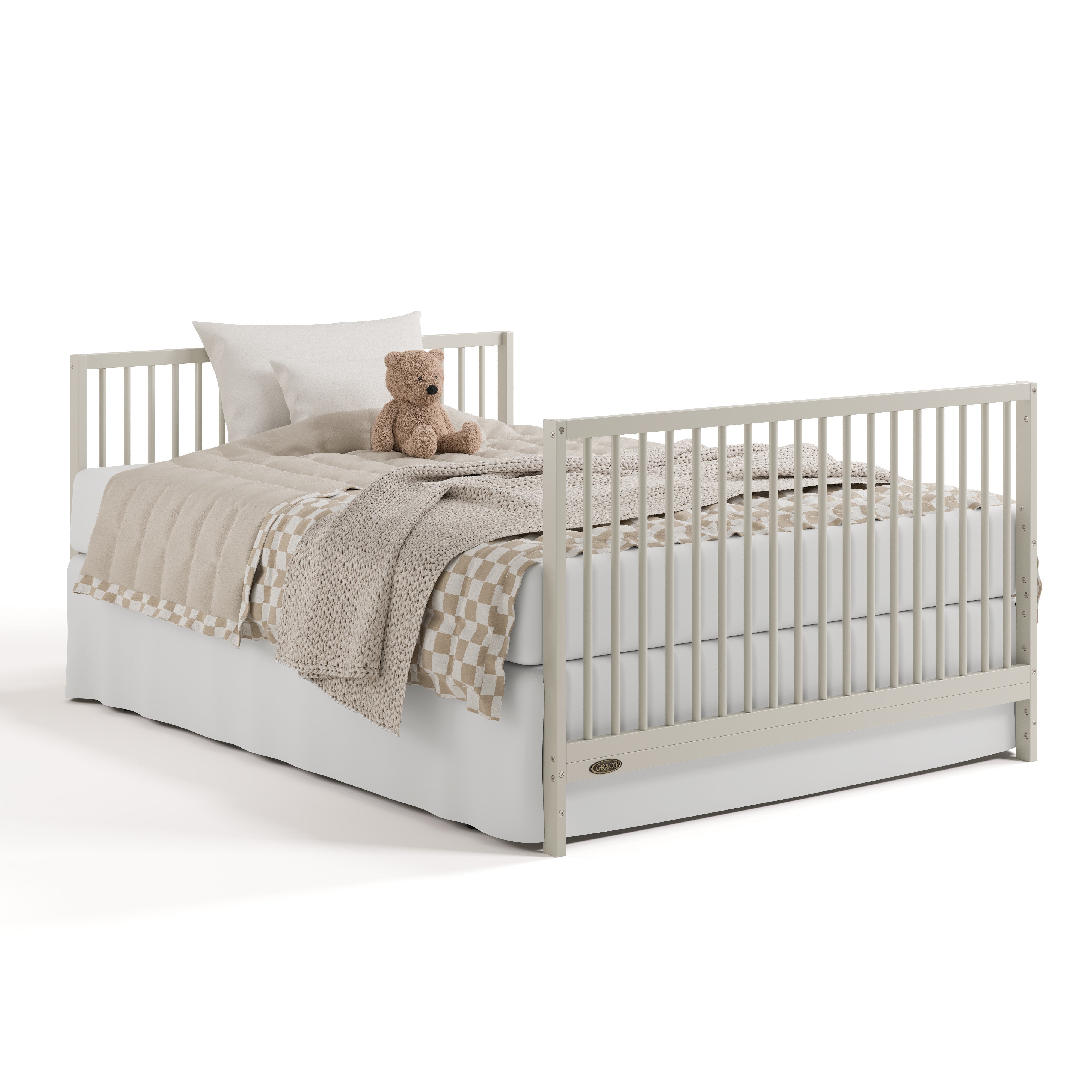 Teddi frosted oat crib and changer converted to full-size bed with footboard