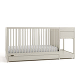 Teddi frosted oat crib and changer angle view