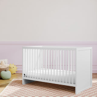 white crib in nursery