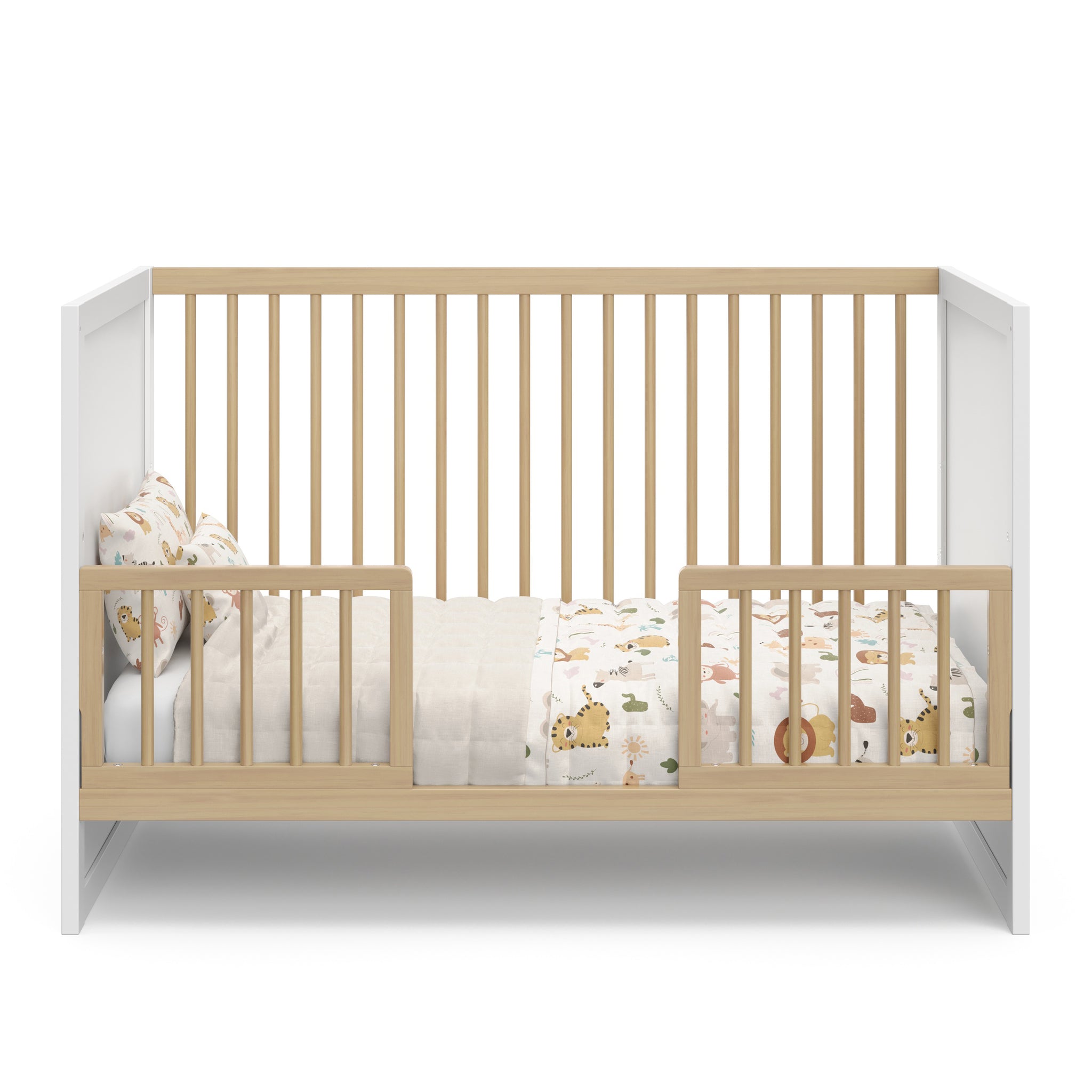 white with driftwood crib in toddler conversion with two toddler safety guardrails