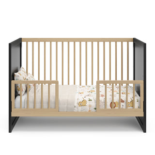 black with driftwood toddler bed with two toddler safety guardrail