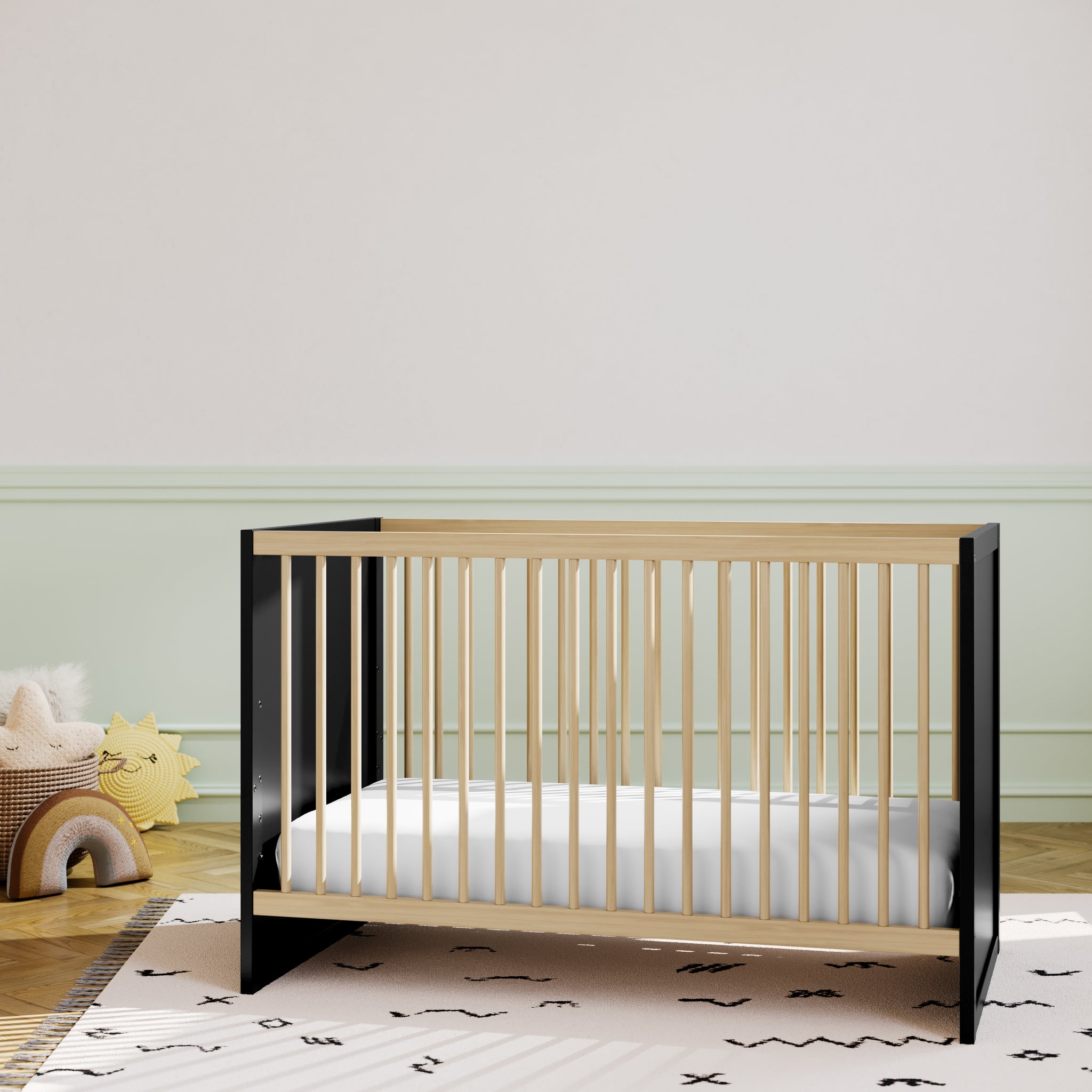 black with vintage driftwood crib in nursery