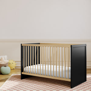 black with vintage driftwood crib in nursery