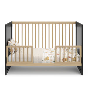 Driftwood Toddler Safety Guardrail Kit with dowels applied in toddler bed