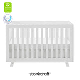 Beckett white crib with GGG and PTPA logo on top left