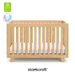 Beckett natural crib with GGG and PTPA logo on top left