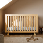 Beckett natural crib in nursery