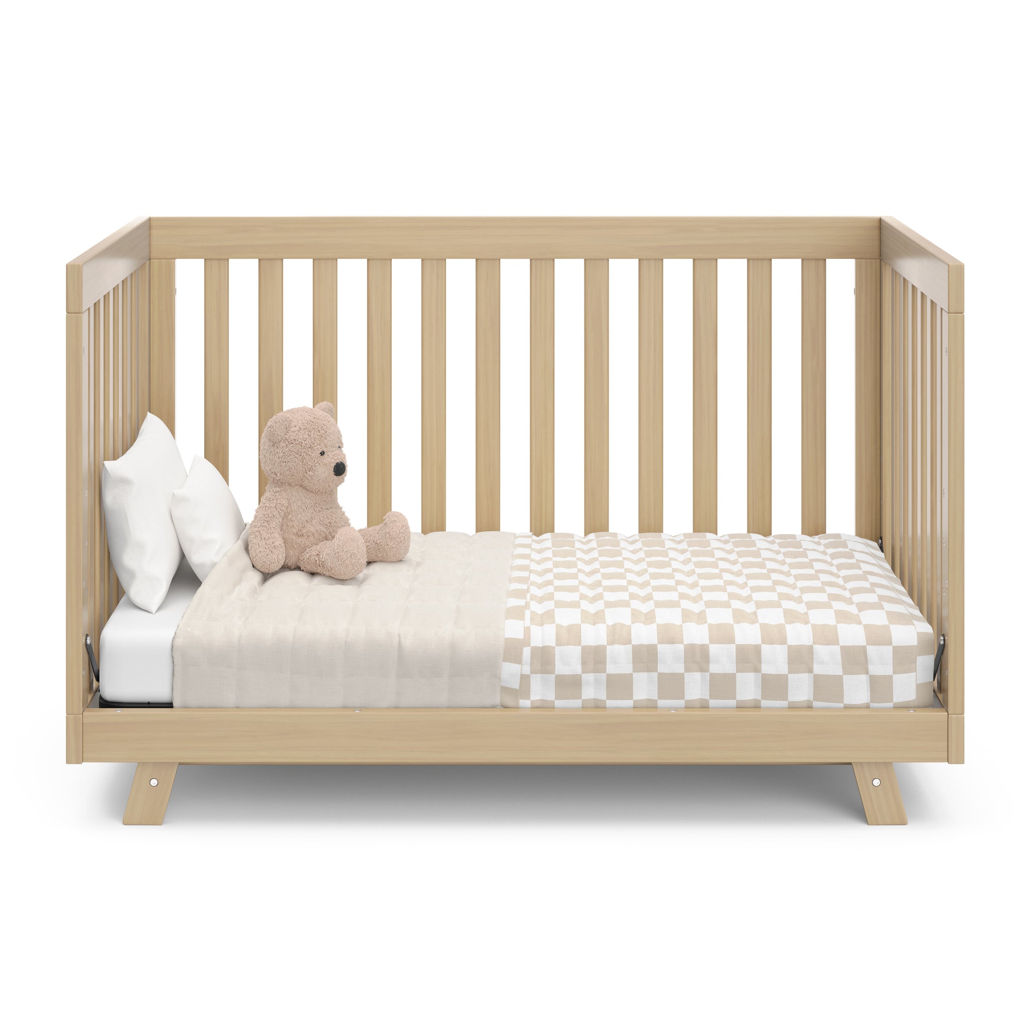 Front view of Driftwood Crib in toddler bed conversion 