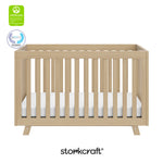 Beckett driftwood crib with GGG and PTPA logo on top left