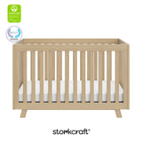 Beckett driftwood crib with GGG and PTPA logo on top left