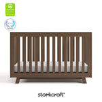 Beckett hazelnut crib with GGG and PTPA logo on top left