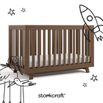 Beckett hazelnut crib with black doodles overlaid on image