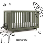 Beckett olive crib with black doodles overlaid on image
