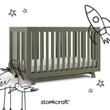 Beckett olive crib with black doodles overlaid on image