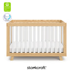 Beckett crib natural with white with GGG and PTPA logo on top left