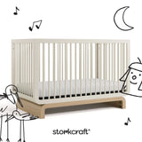 Santorini frosted oat with driftwood crib with black cartoon drawings