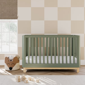 Olive crib with a natural wood color base in nursery