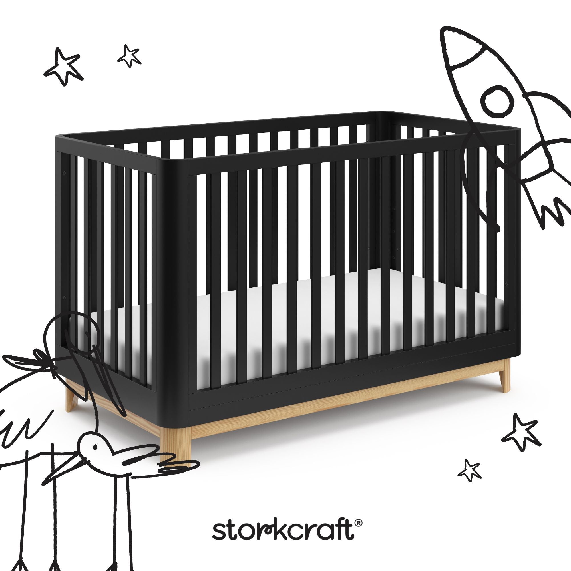 santos black with natural crib with black cartoon drawings
