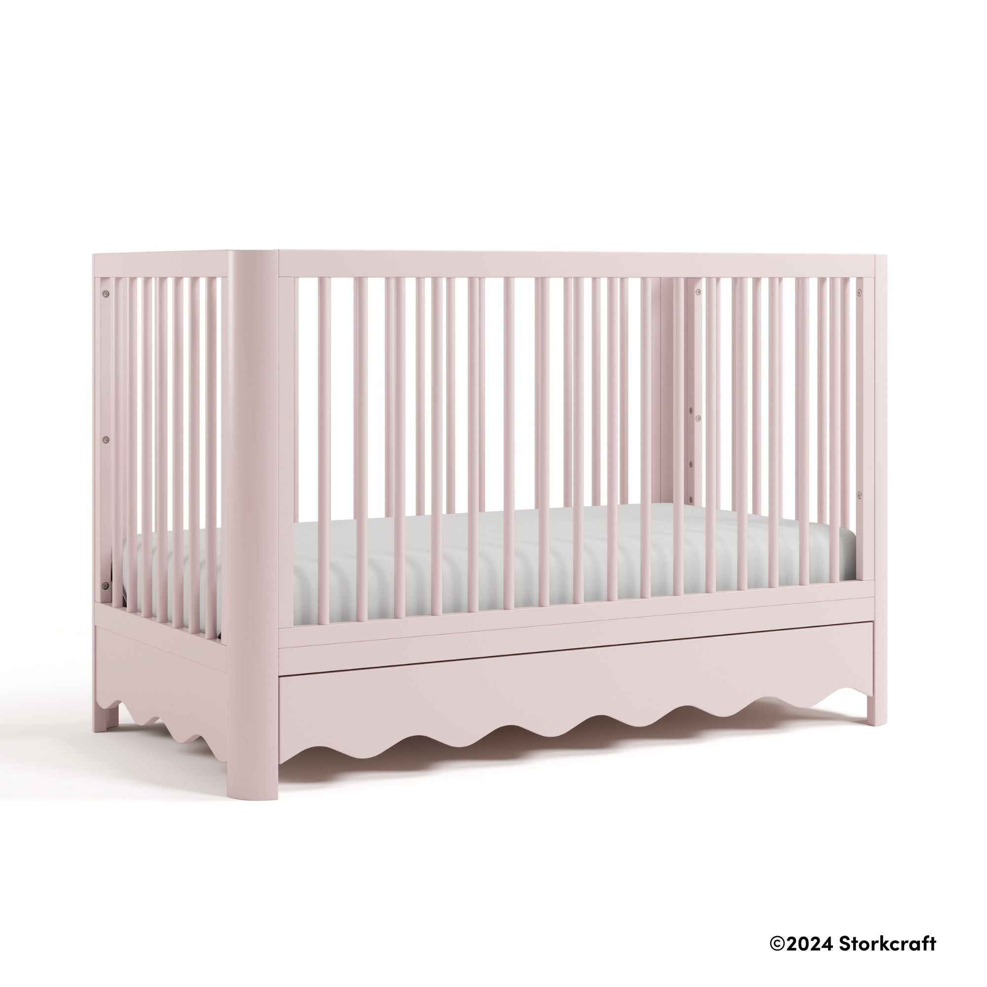 Casablanca blush crib with 2024 Storkcraft copyright on bottom right