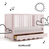 Casablanca blush crib with drawer with black doodles overlaid on image